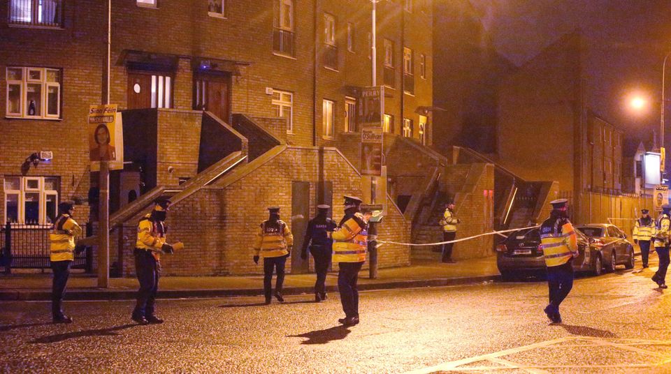 Garda swarm around the scene on Poplar Row in north inner city Dublin where Eddie Hutch was shot