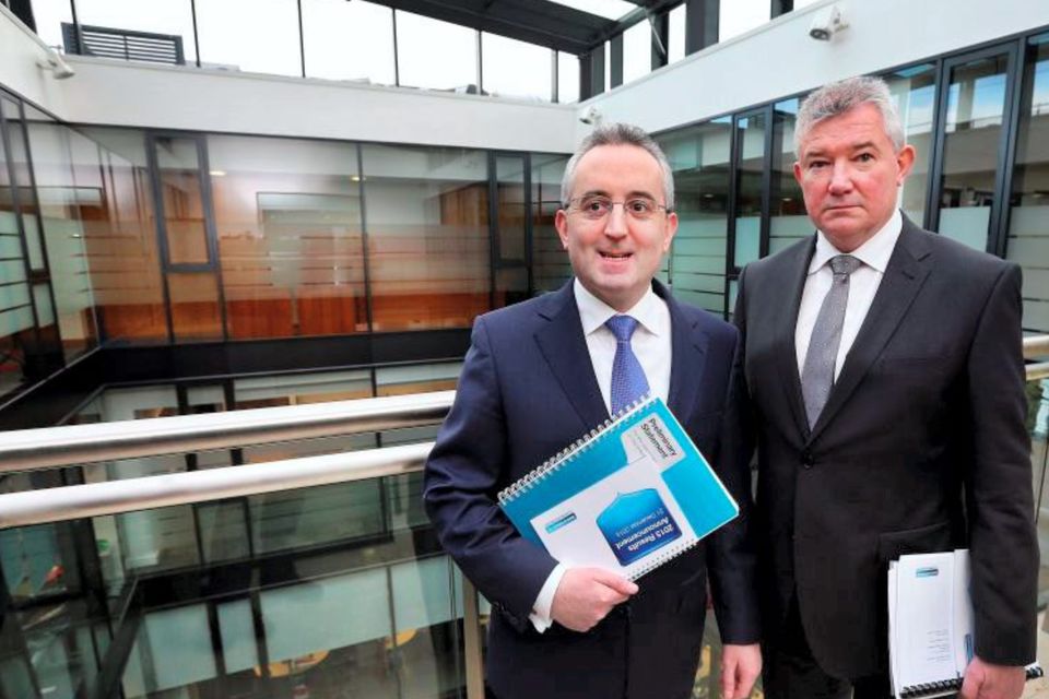 Bank of Ireland chief executive officer Richie Boucher (right) is to undergo medical treatment for cancer