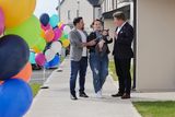 thumbnail: Minister for Housing, Local Government and Heritage Darragh O’Brien with new houseowners, Adran, Andree Berci and their son Damian Berci. Photo by Valerie O'Sullivan.