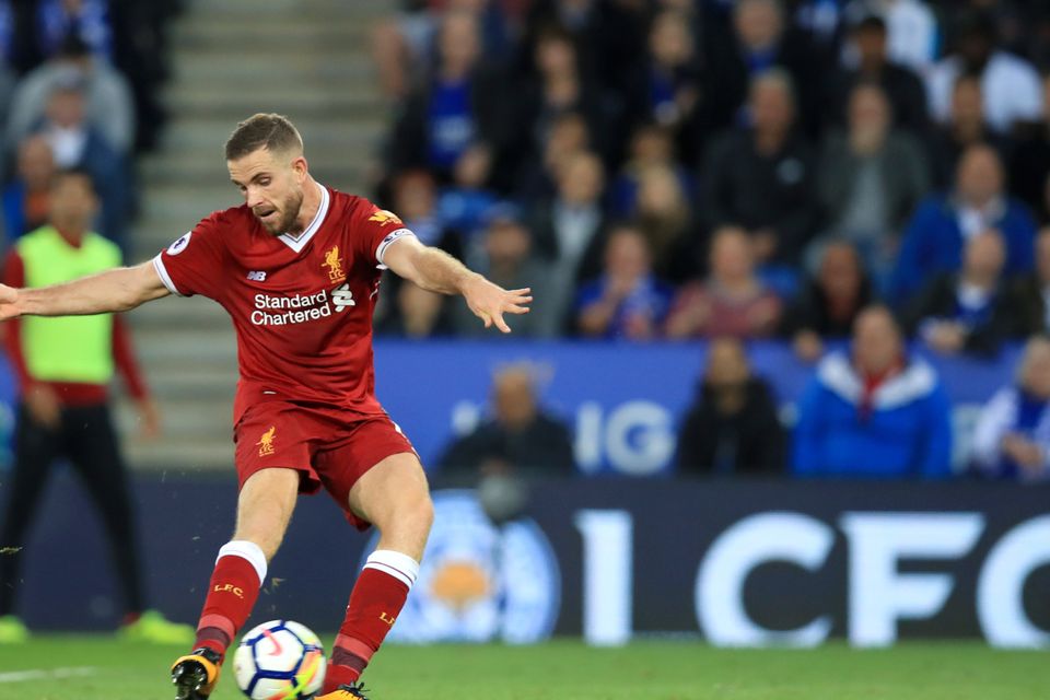 Liverpool's Jordan Henderson scores in their 3-2 win over Leicester on Saturday.