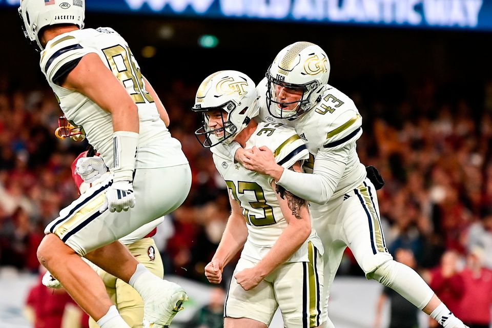 24 August 2024; Georgia Tech Yellow Jackets kicker Aidan Birr is congratulated by David Shanahan after kicking the match winning field goal during the 2024 Aer Lingus College Football Classic match between Florida State and Georgia Tech at Aviva Stadium in Dublin. Photo by Brendan Moran/Sportsfile 