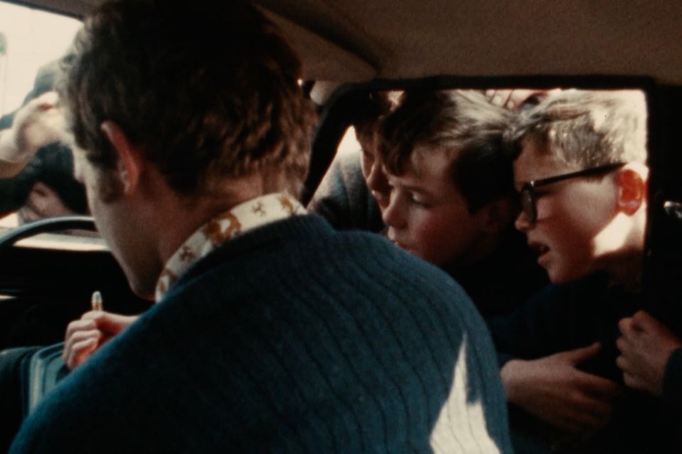Martin McGuinness was captured in the 1972 film showing his gun and bullets to young children