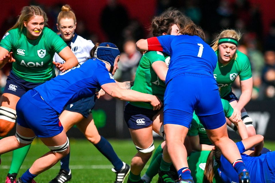 Deirbhile Nic a Bhaird of Ireland is tackled by Annaelle Deshayes of France