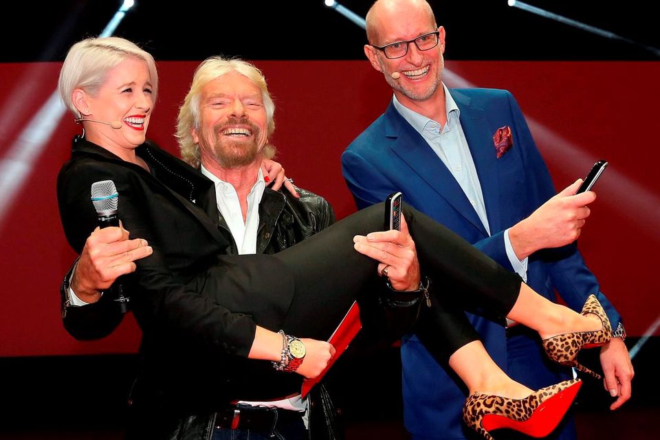 Richard Branson and Sinead Kennedy pictured at the RDS with Magnus Ternsjo CEO of UPC Ireland. Picture: Colin Keegan/Collins Dublin