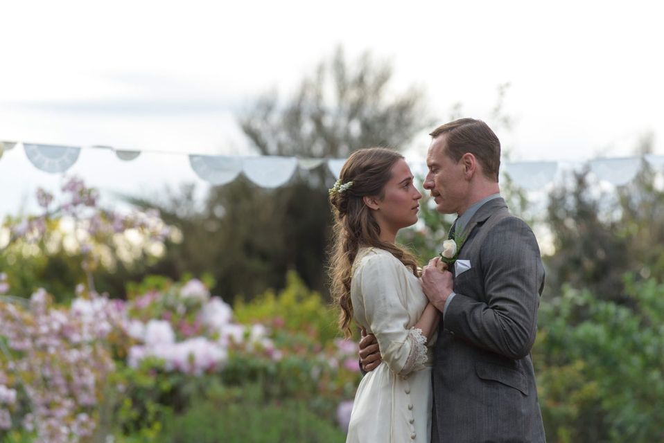Michael Fassbender stars as Tom Sherbourne and Alicia Vikander as his wife Isabel in DreamWorks Pictures poignant drama THE LIGHT BETWEEN OCEANS, written and directed by Derek Cianfrance based on the acclaimed novel by M.L. Stedman.