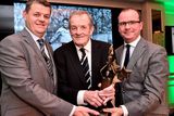 thumbnail: 22 December 2014; Former Dublin player Jimmy Keaveney, who was presented with the Hall of Fame award from Pat King, right, CEO of the Doyle Collection group of hotels and Robert Pitt Chief Executive, Independent News & Media during the Croke Park Hotel / Irish Independent Sportstar of the Year Luncheon 2014. The Westbury Hotel, Dublin. Picture credit: David Maher / SPORTSFILE