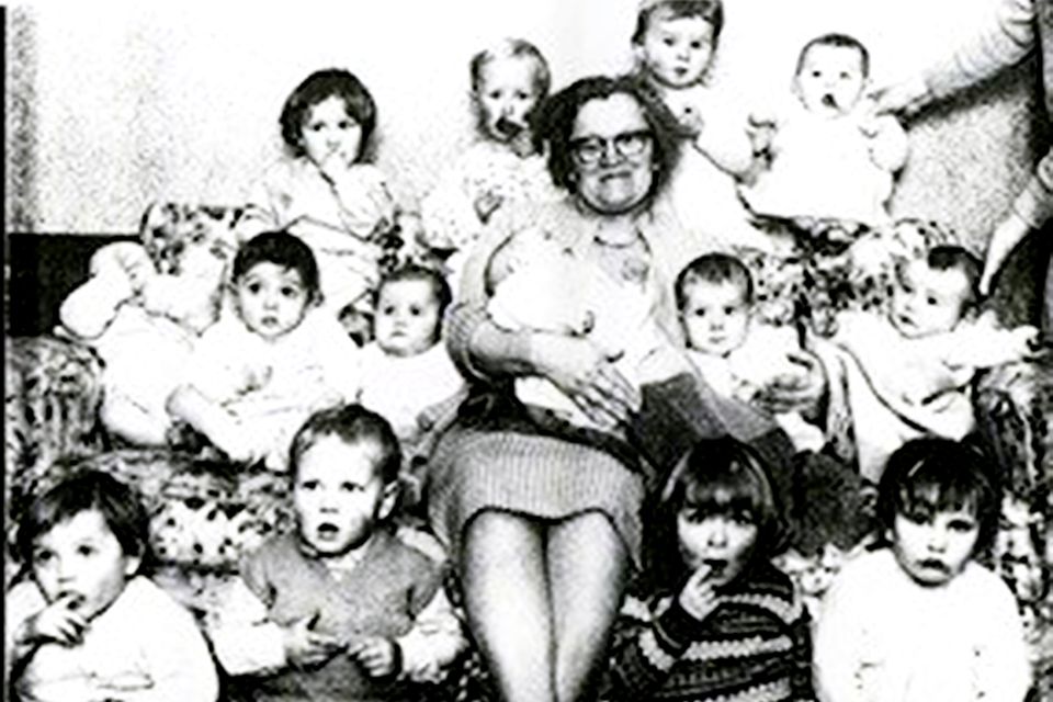 Adeline Mathers with children