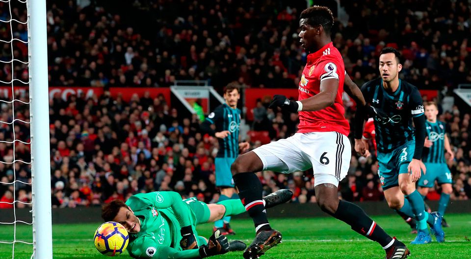 Paul Pogba pokes the ball over the line before seeing what he thought was the lead goal for Manchester United ruled out for offside. Photo: PA Wire