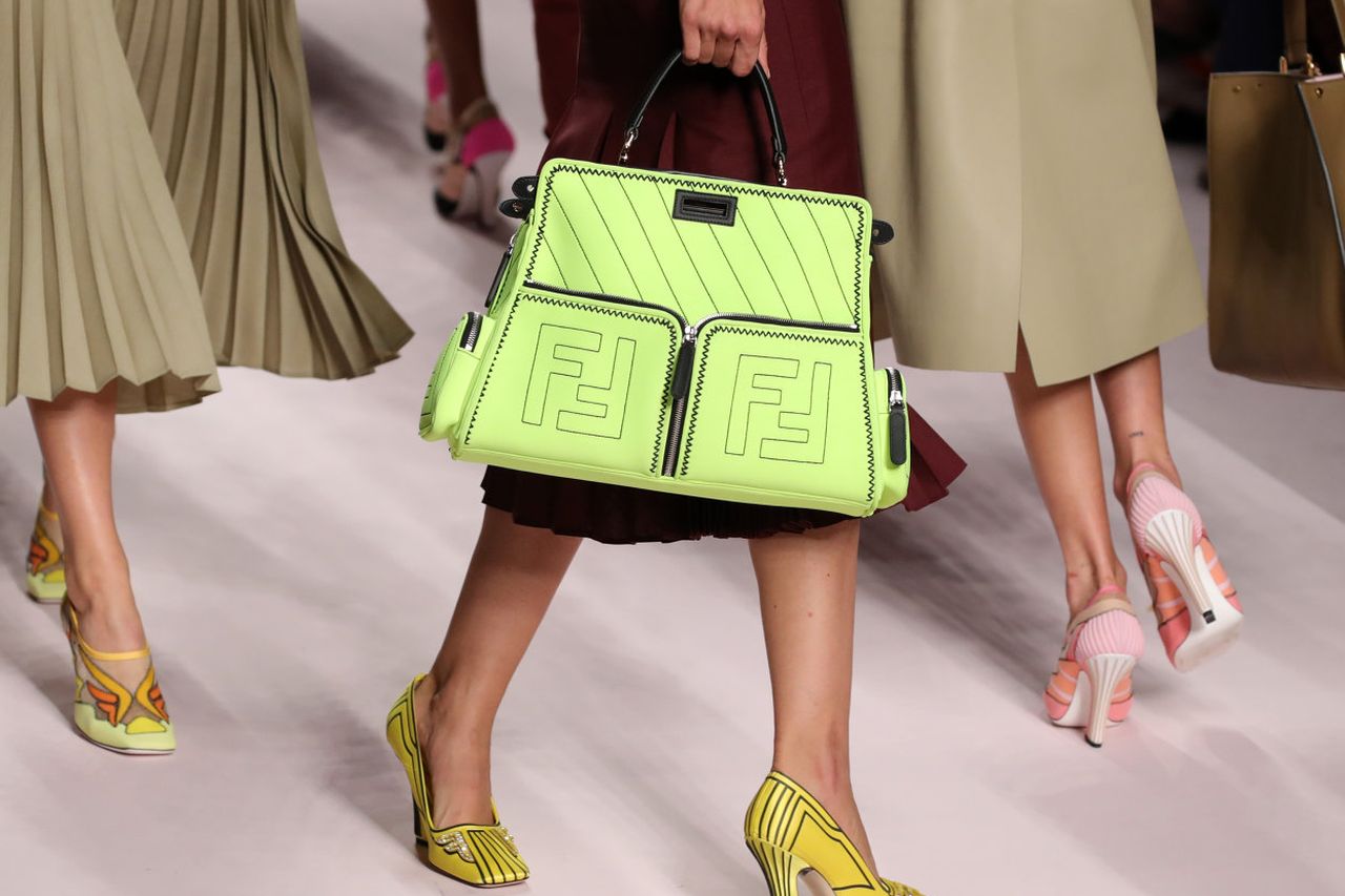 MILAN, ITALY - SEPTEMBER 18, 2019: Woman with black leather Fendi