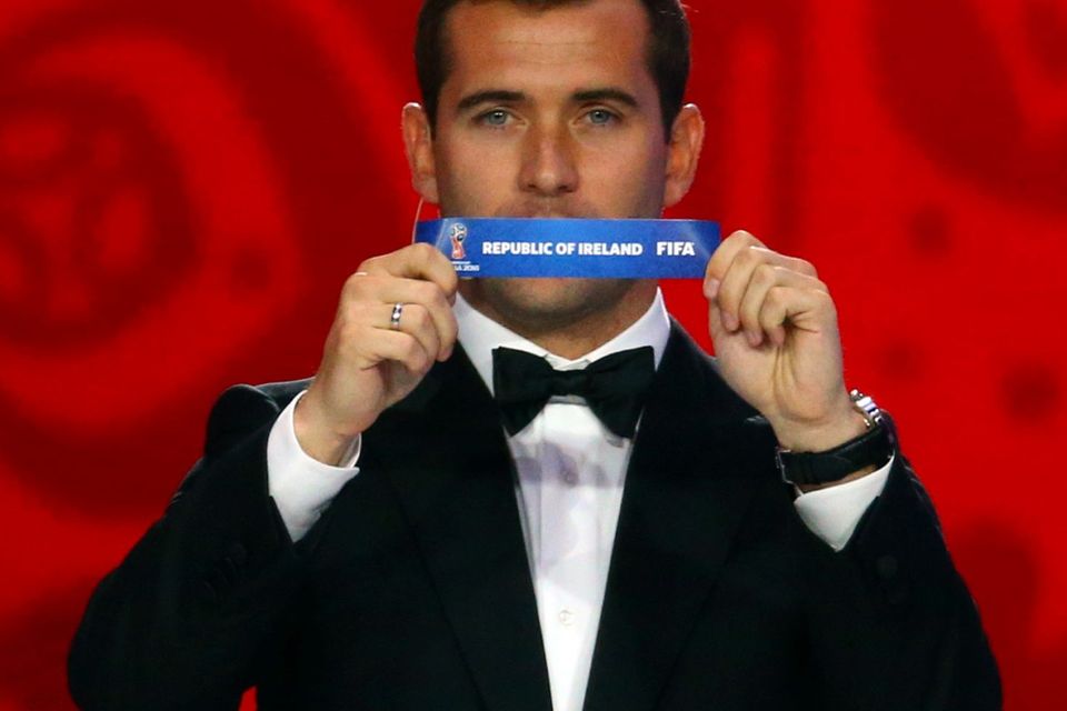Former Russian player Aleksandr Kerzhakov holds up the slip showing ‘Ireland’ during the draw for the 2018 FIFA World Cup in St Petersburg, Russia