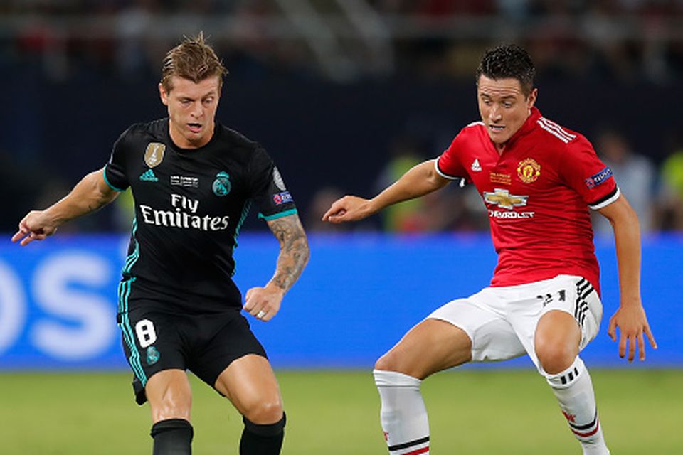 SKOPJE, MACEDONIA - AUGUST 08: Toni Kroos of Real Madrid and Ander Herrera of Manchester United battle for possession during the UEFA Super Cup final between Real Madrid and Manchester United at the Philip II Arena on August 8, 2017 in Skopje, Macedonia.  (Photo by Boris Streubel - UEFA/UEFA via Getty Images)