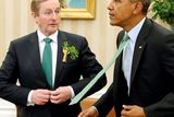thumbnail: U.S. President Barack Obama (R) and Ireland's Prime Minister Enda Kenny button their jackets as they depart for a luncheon at the U.S. Capitol after their meeting in the Oval Office as part of a St. Patrick's Day visit at the White House in Washington March 17, 2015. REUTERS/Jonathan Ernst