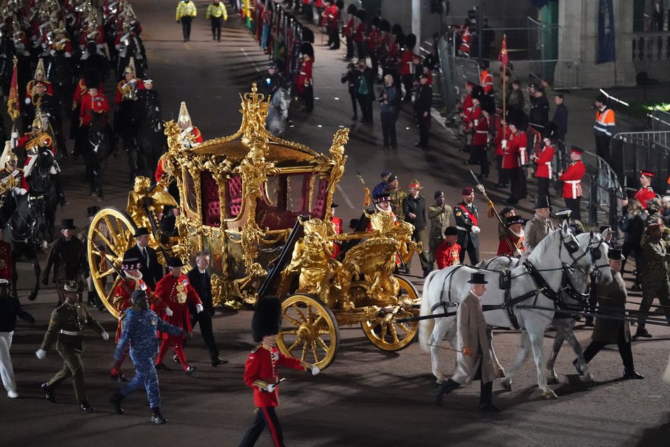 The Diamond Jubilee State Coach and Gold State Coach were marched down the Mall as part of the preparations for the full event on May 6 (James Manning/PA)