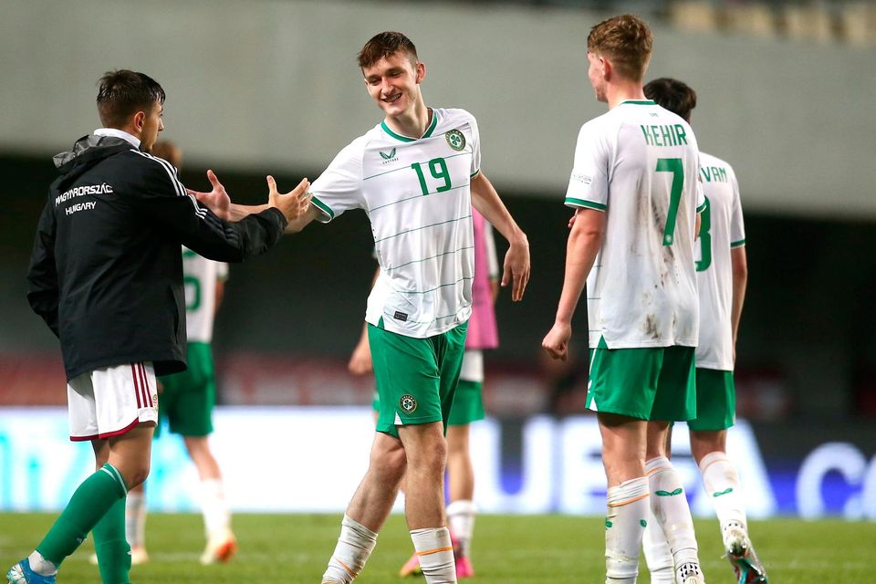 Ireland's Mason Melia, centre, and Luke Kehir after their win over Hungary. Photo: David Balogh/Sportsfile