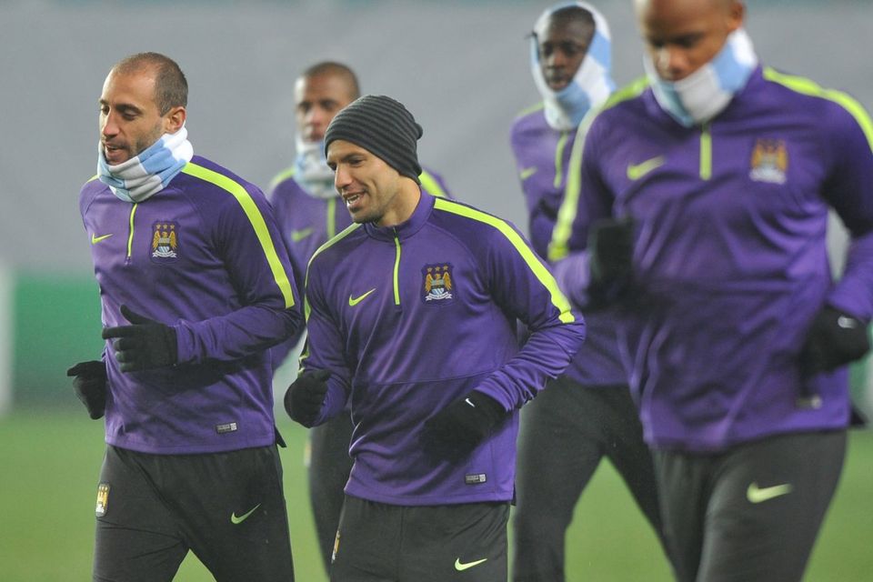 Manchester City's Pablo Zabaleta, Sergio Aguero and Vincent Kompany warm up during a training session ahead of their Champions League tie with CSKA Moscow. Photo: Alexander Fedorov/Anadolu Agency/Getty Images