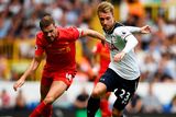 thumbnail: Tottenham's Christian Eriksen in action with Liverpool's Jordan Henderson. Photo: Dylan Martinez