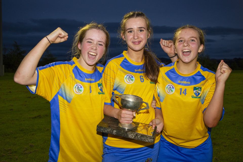 Danielle Shannon, Liadan Agnew and Alannah Murphy celebrate Annacurra winning the Under-14 'A' camogie championship. 