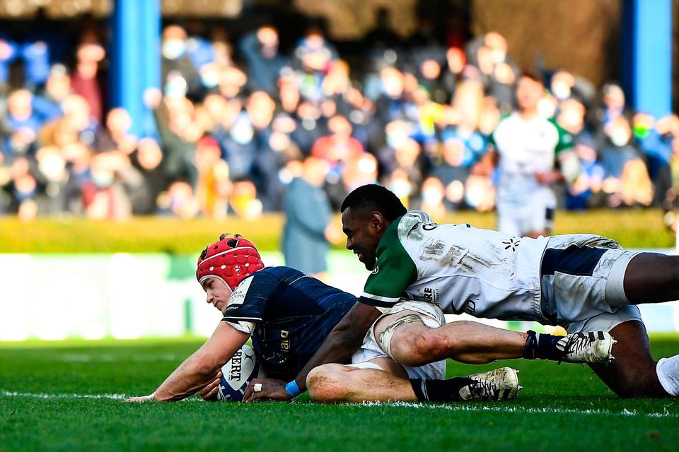 Josh van der Flier of Leinster scores his side's ninth try despite the tackle of Josua Vici of Montpellier Hérault during the Heineken Champions Cup Pool A match between Leinster and Montpellier Hérault at the RDS Arena in Dublin. Photo by Harry Murphy/Sportsfile