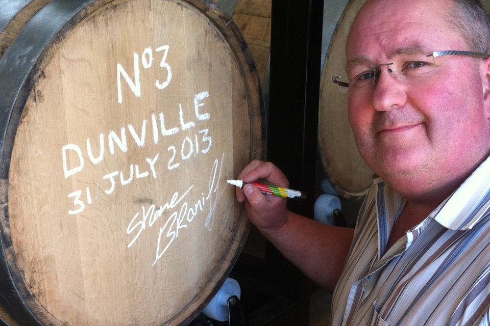 Businessman Shane Braniff with his Dunville whiskey