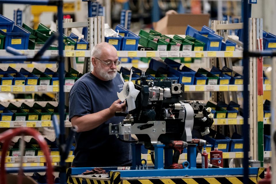 An employee assembles components at the Volvo Construction Equipment Corp. manufacturing facility in Shippensburg, Pennsylvania, U.S., on Wednesday, June 23, 2021. Photographer: Michael A. McCoy/Bloomberg
