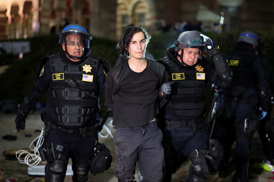 Police detain a protester at UCLA, during a pro-Palestinian rally. Photo: Reuters