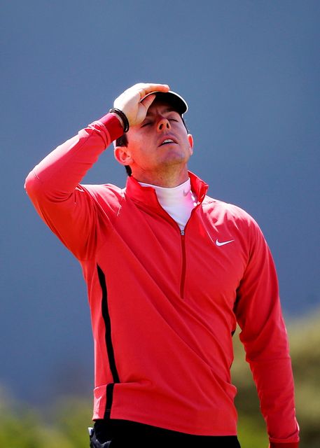 Rory McIlroy reacts to a missed putt on his final hole as he finished the day on 9 over par during day one of the Dubai Duty Free Irish Open at Royal County Down Golf Club, Newcastle. 
Brian Lawless/PA Wire