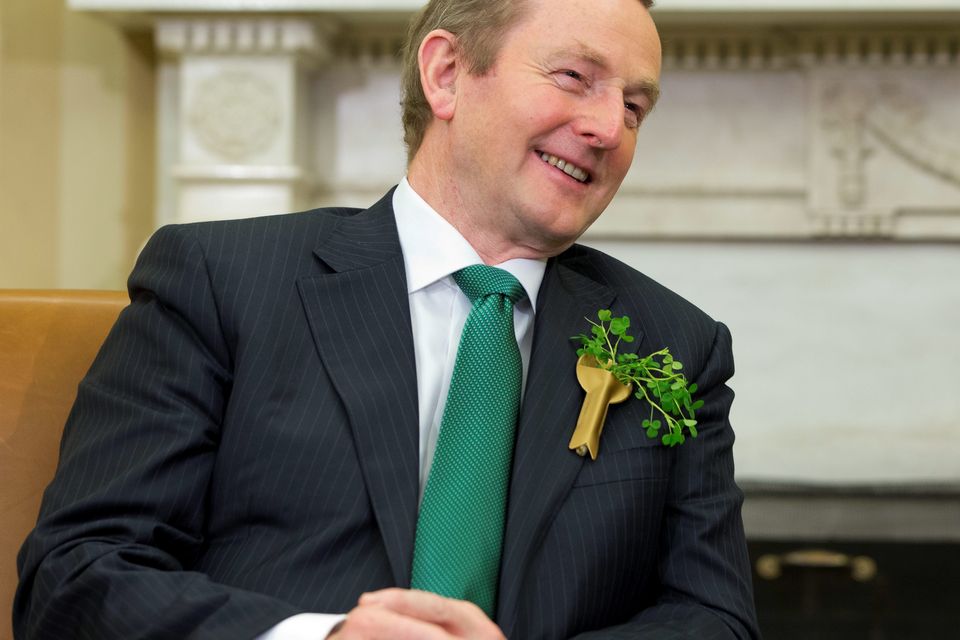 Irish Prime Minister Enda Kenny smiles during a meeting with President Barack Obama in the Oval Office of the White House in Washington, Tuesday, March 17, 2015. (AP Photo/Jacquelyn Martin)