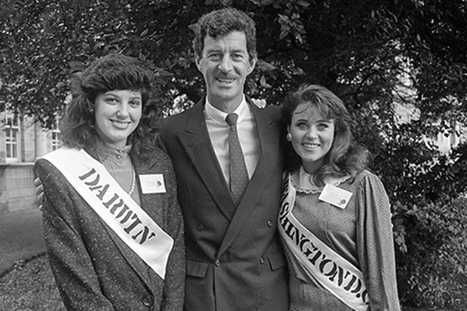 Minister for Labour Dick Spring with the Darwin Rose and the Washington DC Rose outside Leinster House in 1986