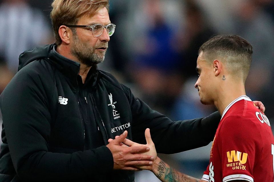 Liverpool manager Jurgen Klopp with Liverpool's Philippe Coutinho after the match