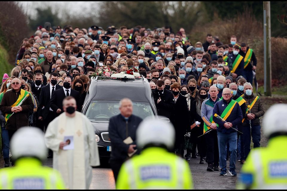 The hearse arrives at Lowertown Cemetery following Ashling Murphy's funeral mass at St Brigid's Church in Mountbolus, Co Offaly, yesterday. Photo: Steve Humphreys