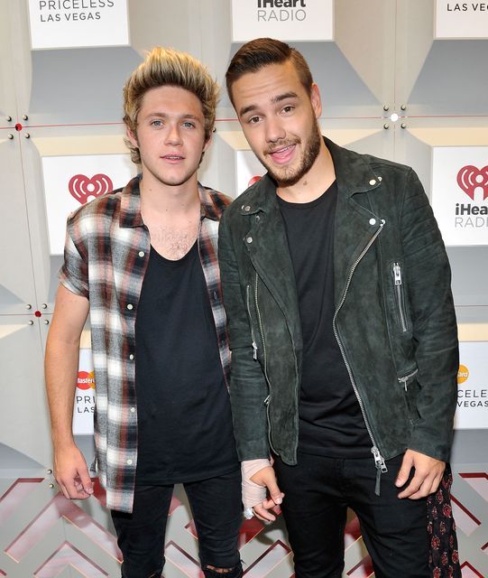 Recording artists Niall Horan (L) and Liam Payne of the music group One Direction attend the 2014 iHeartRadio Music Festival at the MGM Grand Garden Arena