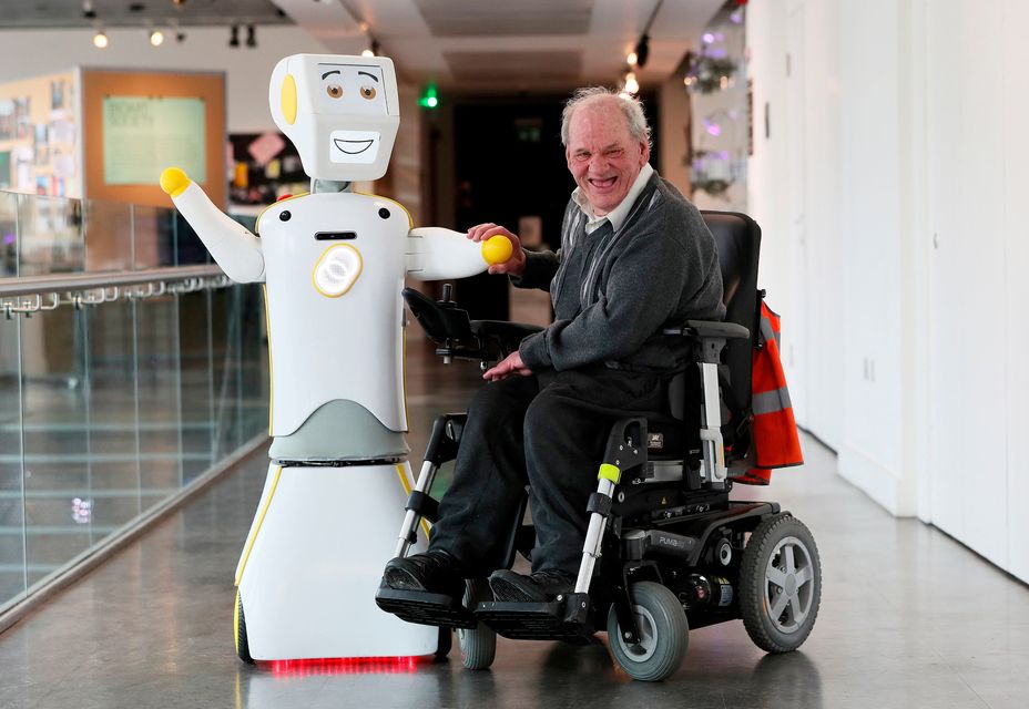 IrelandÕs first socially assistive AI robot 'Stevie II' from robotics engineers at Trinity College Dublin, with Brendan Crean, who helped trial the robot through the charity ALONE, during a special demonstration at the Science Gallery in Dublin.
Brian Lawless/PA Wire