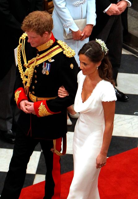 Prince Harry and Maid of Honour Pippa Middleton walk down the aisle at Westminster Abbey following the wedding ceremony of Prince William, Duke of Cambridge and Catherine, Duchess of Cambridge on April 29, 2011