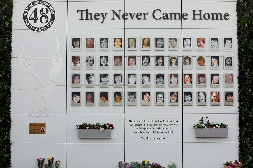 Flowers left for the victims of the stardust tragedy at the memorial wall at the site in Artane (Picture: Gerry Mooney)
