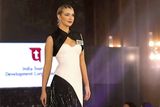 thumbnail: Miss Northern Ireland Kaitlyn Clarke wearing Susan's dress at the Miss World contest in India