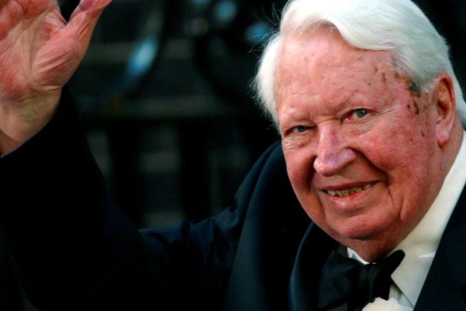 Former British Prime Minister Edward Heath waves as he arrives at number 10 Downing Street in London in this file photo dated April 29, 2002. REUTERS/STR
