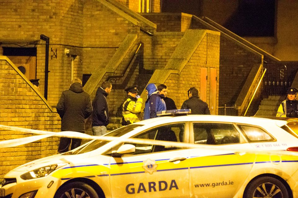 Gardaí swarm around the scene on Poplar Row in north inner city Dublin where Eddie Hutch was shot