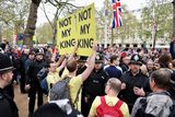thumbnail: Protesters are led away by police on The Mall, shortly before the procession of the coronation of Britain's King Charles and Queen Camilla, in London, Britain May 6, 2023. REUTERS/Kevin Coombs