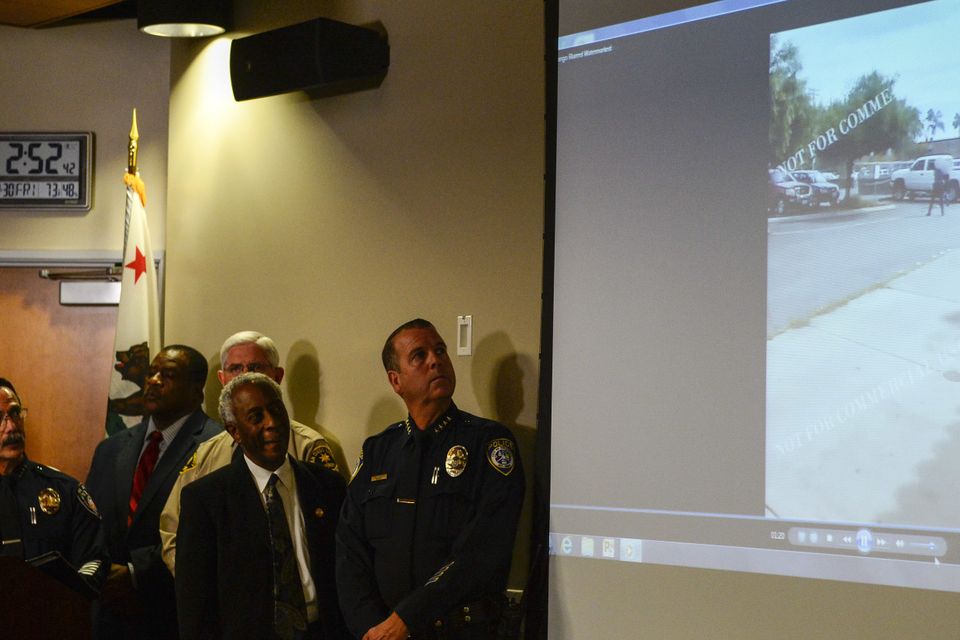Police watch a video of the shooting of Alfred Olango, at a news conference in El Cajon (AP)