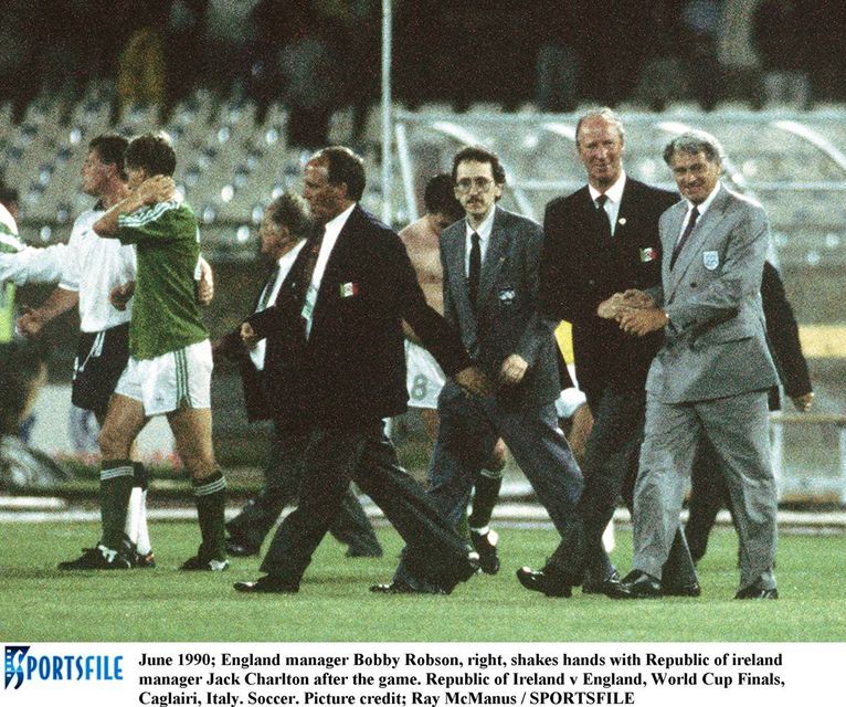 June 1990; England manager Bobby Robson, right, shakes hands with Republic of ireland manager Jack Charlton after the game. Republic of Ireland v England, World Cup Finals, Caglairi, Italy. Soccer. Picture credit; Ray McManus / SPORTSFILE