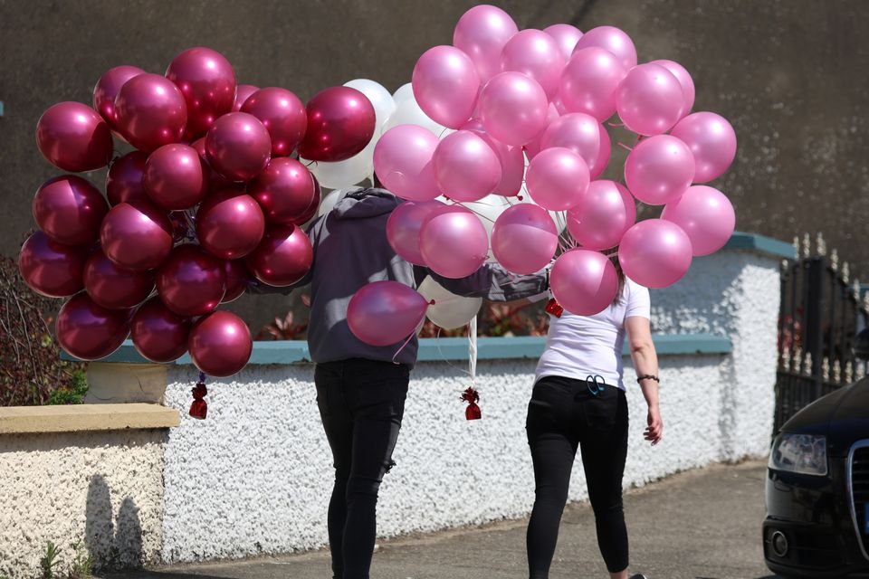 Balloons are carried to the grave of Molly Dempsey from Baltinglass, Co Wicklow. Her funeral took place at St. Joseph's Church, Baltinglass. Photo: Colin Keegan, Collins Dublin