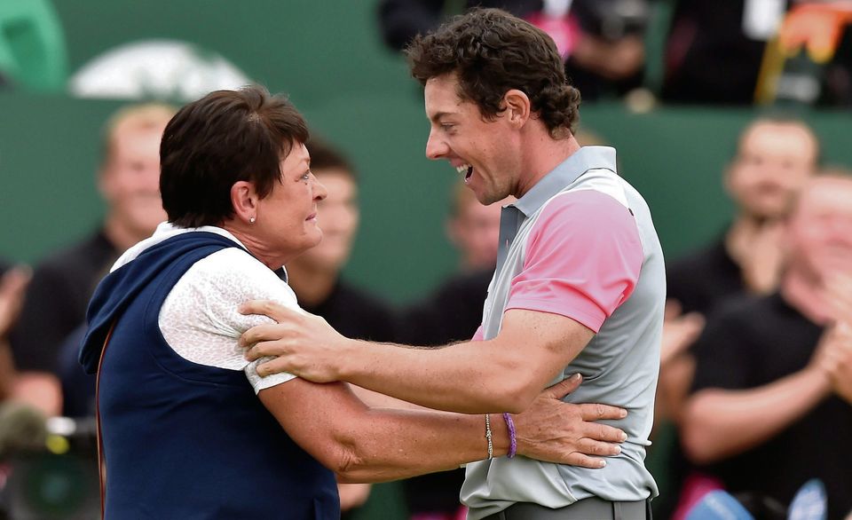 Rory McIlroy celebrates with his mother, Rosie, after winning the British Open.  PA WIRE