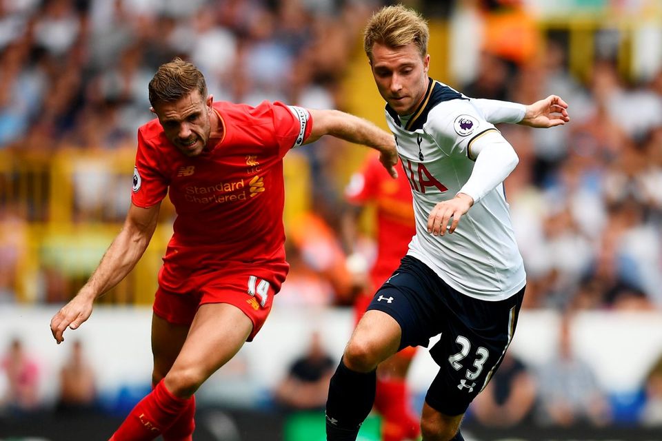 Tottenham's Christian Eriksen in action with Liverpool's Jordan Henderson. Photo: Dylan Martinez